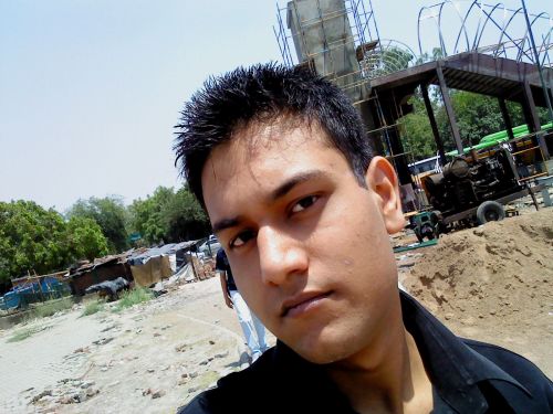 Me outside the supermarket.. Sunny day lol